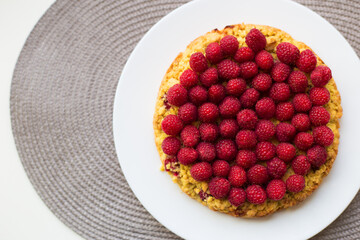 bright raspberry cake on a plate