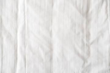 Plakat White bed linen, sheet as texture or background, crumpled blank bedclothes top view