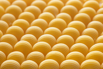 Raw pipe rigate pasta. Italian pasta Pattern, food background or texture close up