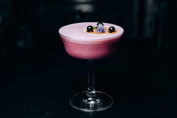 A refreshing alcoholic cocktail of gin grapefruit juice and raspberry puree.  cocktail menu.