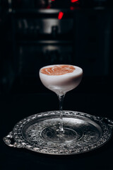 Traditional winter eggnog with milk, rum and cinnamon, sprinkle chocolate,selective focus.Close up.