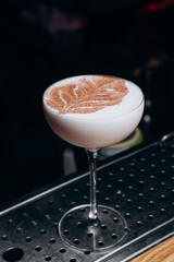 Traditional winter eggnog with milk, rum and cinnamon, sprinkle chocolate,selective focus.Close up.