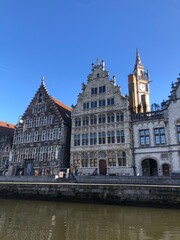 Obraz premium Old buildings next to the river in Gent