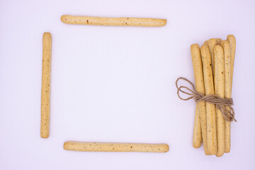 Breadsticks on light background