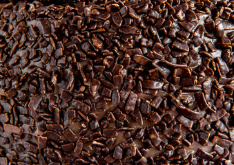 Chocolate cake texture background, brigadeiro granules background.