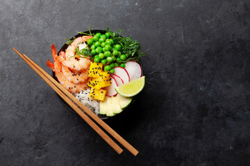 Poke bowl with shrimps, avocado and mango
