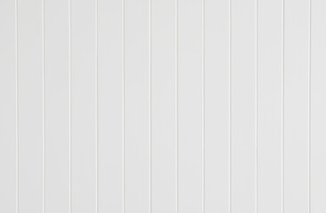White wall wooden groove vertical texture. wall panel spray white color design of decoration.