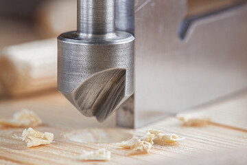 Countersink drill bit make sink in hole for screw in old wooden plank