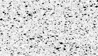 Small uneven spots and particles of debris. Abstract vector texture. Distressed uneven background. Grunge texture overlay with fine grains isolated on white background. Vector illustration. EPS10.