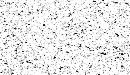 Small uneven spots and particles of debris. Abstract vector texture. Distressed uneven background. Grunge texture overlay with fine grains isolated on white background. Vector illustration. EPS10.