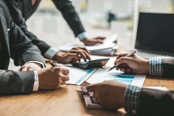 Business man group are meeting together in the office, they are meeting on the topic of finance and financial management, they are business partners. Concept financial management for startup companies
