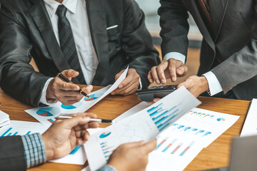 Business man group are meeting together in the office, they are meeting on the topic of finance and financial management, they are business partners. Concept financial management for startup companies