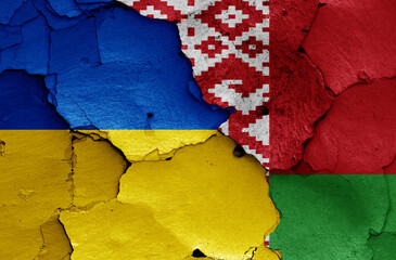 flags of Ukraine and Belarus painted on cracked wall
