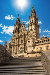 Santiago de Compostella,Spain - May 1st 2022 - View of Obradoiro square and cathedral of Santiago, one of the most important Christian pilgrimage places - obrazy, fototapety, plakaty