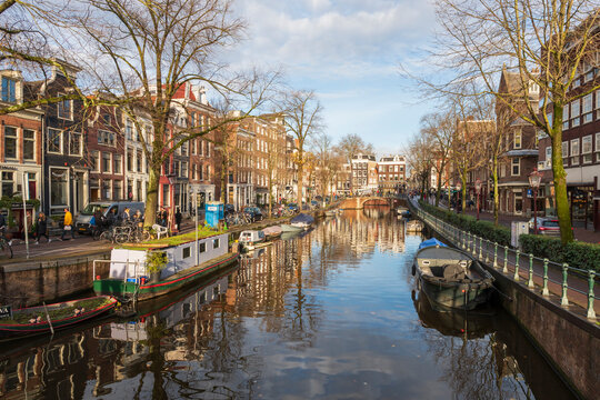 Amsterdam Holland Netherlands on December 11, 2021: Houses by the canal in winter © ANADEL