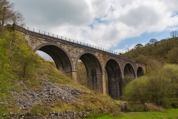 The Victorian Midland Railway Headstone Viaduct, now part of the Monsal Trail cycleway, in Monsal Dale in England's Peak District National Park.
