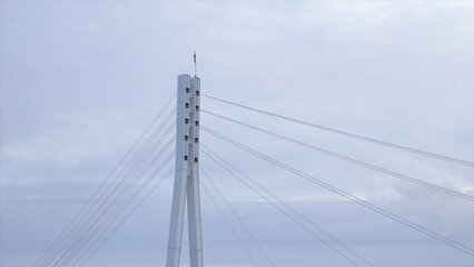 Bridge slings on the background of clouds. Stock. View of the bridge slings
