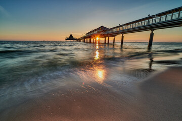 tourist attraction pier of Heringsdorf on island of Usedom at baltic sea in the morning