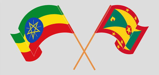 Crossed and waving flags of Ethiopia and Grenada