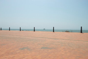 Fototapeta premium Amazing shot of a big boat far away offshore in caribbean see at colombian Santa Marta City