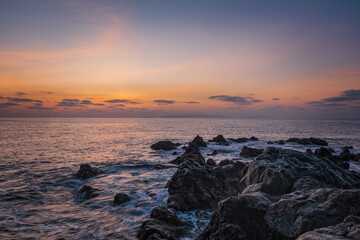 Obraz premium Sunrise on Reis Magos beach. Canico, Madeira, Portugal. October 2021.
