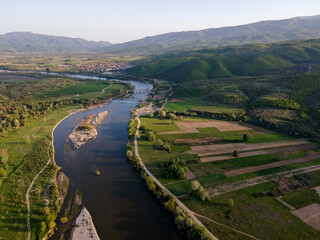 Fototapeta na wymiar Aerial Sunset view of Struma river passing, Bulgaria