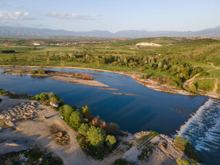 Aerial Sunset view of Struma river passing, Bulgaria