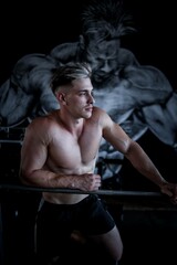 Fototapeta na wymiar Portrait of a man in the gym