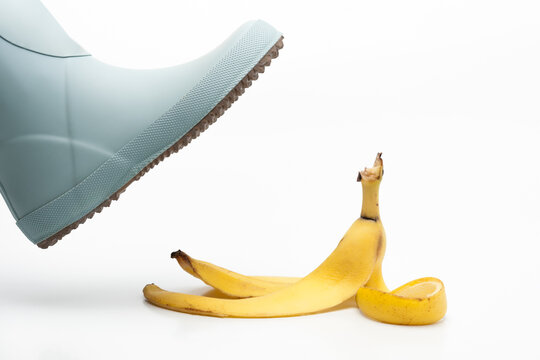 conceptual composition with a boot and banana peel