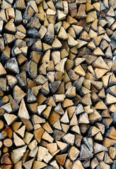 Stack pile of firewood logs for domestic fuel house fire heating.