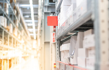 The racking shelf plate with copy space for use to show label a product detail or row number. Placed in the factory warehouse store.