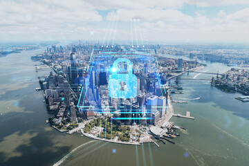 Aerial panoramic helicopter city view on Lower Manhattan district and financial Downtown, New York, USA. The concept of cyber security to protect confidential information, padlock hologram