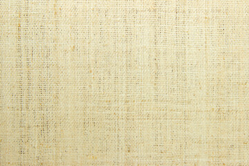 Jute hessian sackcloth burlap canvas woven texture background pattern in light beige cream brown color blank. 