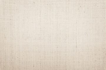 Jute hessian sackcloth burlap canvas woven texture background pattern in light beige cream brown color blank. 