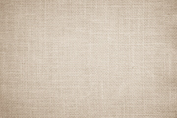 Fototapeta na wymiar Jute hessian sackcloth burlap canvas woven texture background pattern in light beige cream brown color blank. 