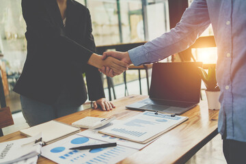 Successful negotiation and handshake concept, two businessman shake hand with partner to celebration partnership and teamwork, business deal