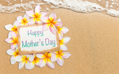 Happy Mother's day card with plumeria flower frame on the beach, tropical style