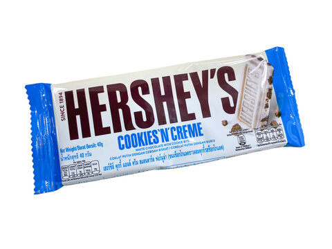 Caption Bangkok Thailand 19 Nov 2020: A single Hershey's Cookies and creme Chocolate bar in the pack on the table. Hershey's is the largest chocolate manufacturer in North America.