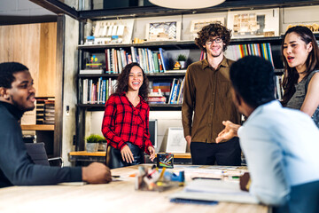 Group of business meeting and discussing strategy with startup project analysis finance process.Success business people plan and brainstorm marketing idea with document in office.Teamwork