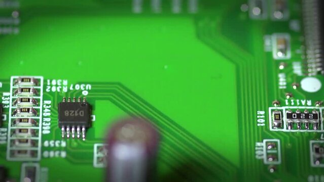 very slow flight over a green circuit board - reverse