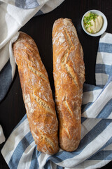 Home made fresh french Baguette loafs on a table