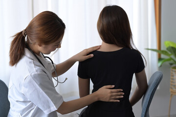Fototapeta premium Shot of physiotherapist doing treatment with patient in medical clinic. Physical therapy concept.