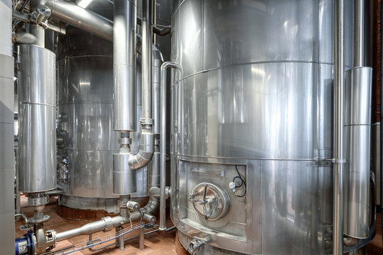 Large yeast fermentation tanks. Industrial production of beer