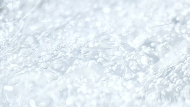 Macro white transparent cosmetic serum gel, cream, fluid texture with air bubble