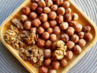 Walnuts and hazelnuts on a plate