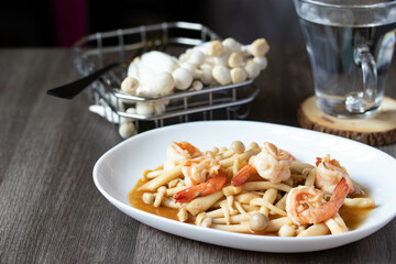 Sauteed Shimeji Mushrooms with Prawns in a White Plate