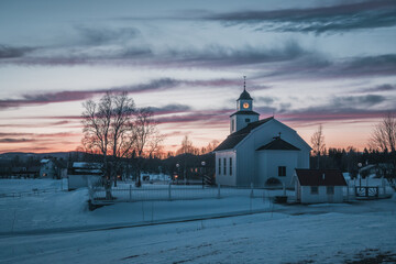 Sweden Jämtland (Lapland). The church of Storsjö, a cozy town next to Ljungdalen during blue...