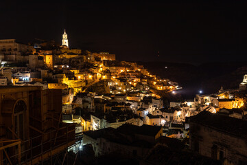 Fototapeta na wymiar Night landscape of the Sassi of Matera, well-known for their ancient cave dwellings. Basilicata. Italy