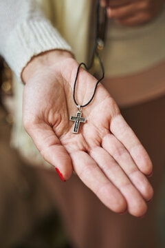 Orthodox cross on a woman's palm