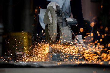 Close-up detail of construction engineer workers cutting rebar and reinforcement at a construction...